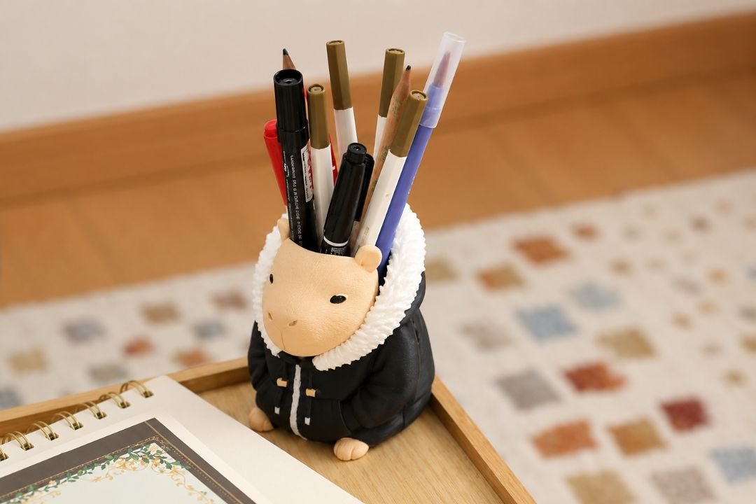 3D printed capybara pen holder with pens inside