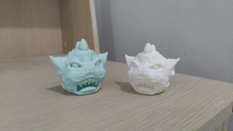 Perbandingan hasil cetakan model 3D Monster Head guna AD5X vs Ender 3 V2